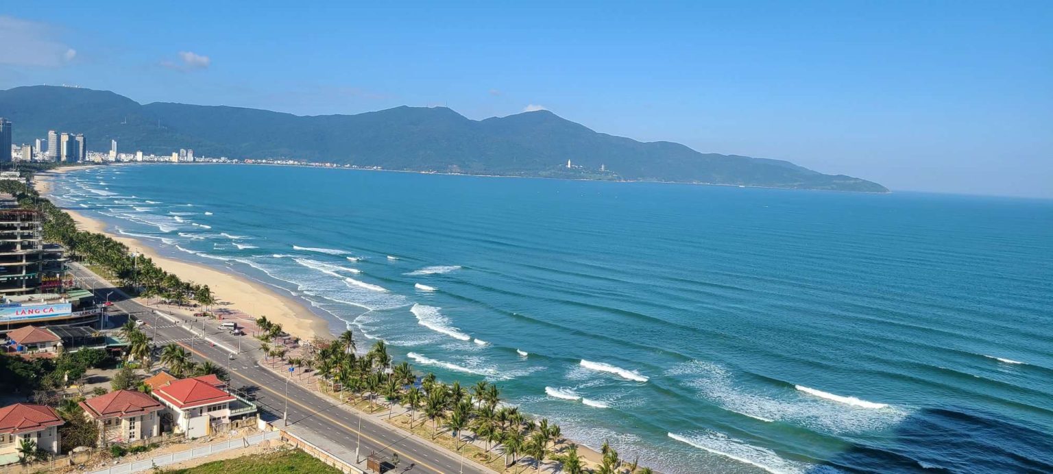 Surfing in My Khe Beach, Da Nang, Vietnam Let’s live healthy and happily